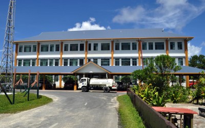 Water tanker filling up from roof run-off from the government building, Funafuti Atoll, Tuvalu