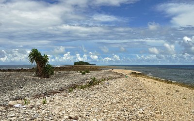 The western end of Fongafale Island, Funafuti Atoll, Tuvalu. Pacific Ocean on the left, lagoon on the right. Next island in the distance.