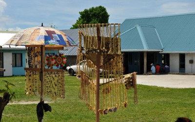 Tiny craft market springs up outside Funafuti International Airport, Tuvalu, on flight days.