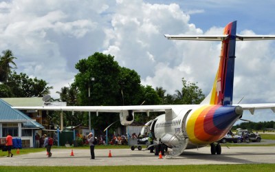Passengers disembarking from the Air Pacific ATR42 from Suva, just arrived at Funafuti International Airport, Tuvalu