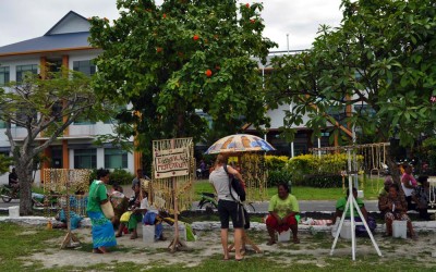 Tiny craft market springs up outside Funafuti International Airport, Tuvalu, on flight days.
