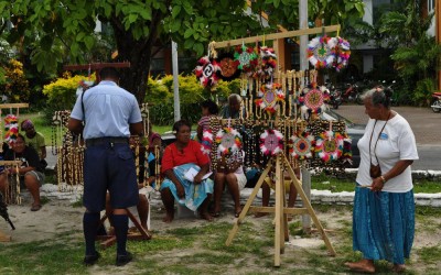 Tiny craft market springs up outside Funafuti International Airport, Tuvalu, on flight days.