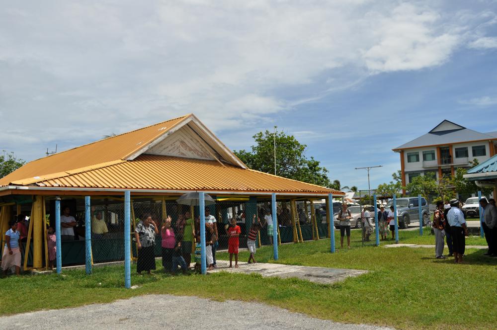 The crowd gathers to wave farewell, Funafuti International Airport, Tuvalu, to greet new arrivals