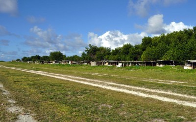 Pig sties near the end of the runway, Fongafale, Tuvalu