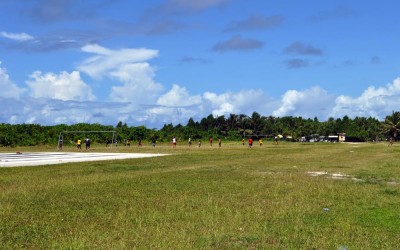 Sports match at the end of the runway, Funafuti Atoll, Tuvalu