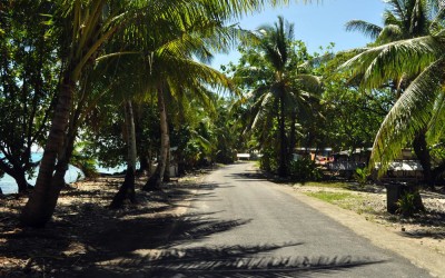 Main road running west of Vaiaku township, along Fongafale Island, Funafuti Atoll, Tuvalu
