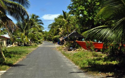 Main road running west of Vaiaku township, along Fongafale Island, Funafuti Atoll, Tuvalu