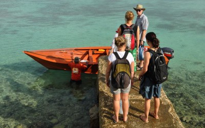 Getting into our boat for the ride out to Funafala, Funafuti Atoll, Tuvalu
