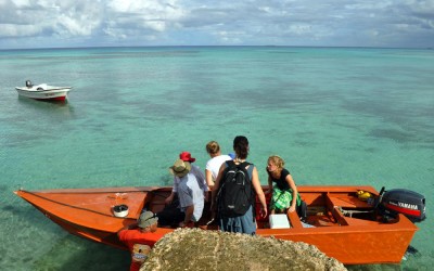 Getting into our boat for the ride out to Funafala, Funafuti Atoll, Tuvalu